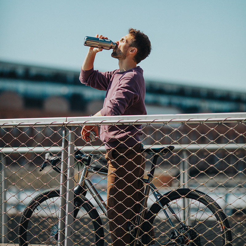 12oz-rise-reflect-with-bamboo-cap-l4 16oz_rise_reflect_man_bike_square.jpg
