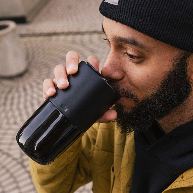 16oz-rise-tumbler-t8 16oz_rise_tumbler_black_man_drink_square.jpg