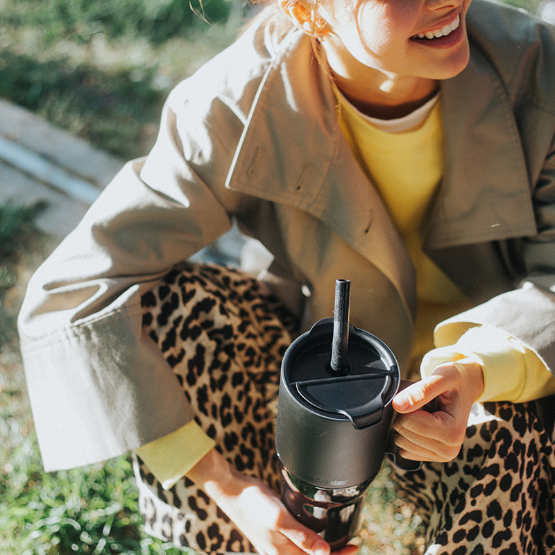 26oz-rise-tumbler-with-straw-lid-t8 26oz_rise_tumbler_black_woman_topview_square.jpg