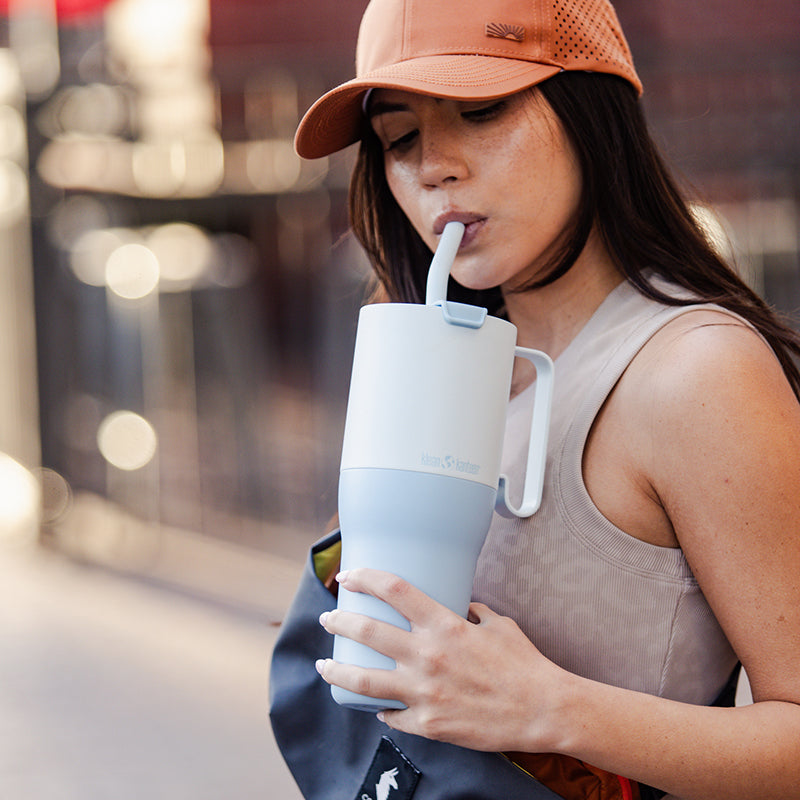 36oz-rise-tumbler-with-straw-lid-i9 36oz_rise_tumbler_straw_girl_sip_square.jpg