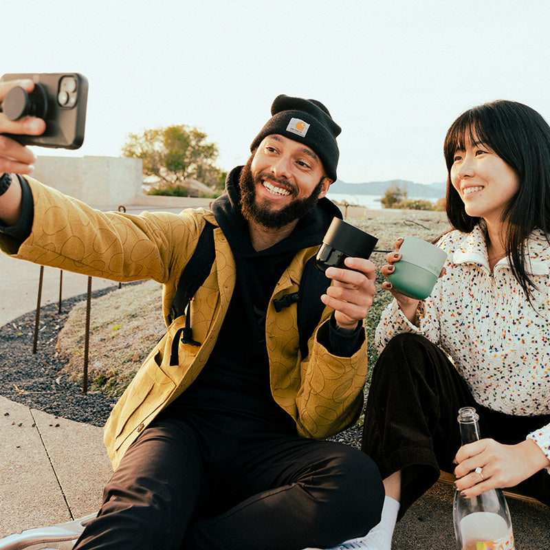 bring-your-own-party-kit-tumblers-and-cocktails-i1 8oz_rise_lowball_black_iceberg_couple_selfie_city_square.jpg