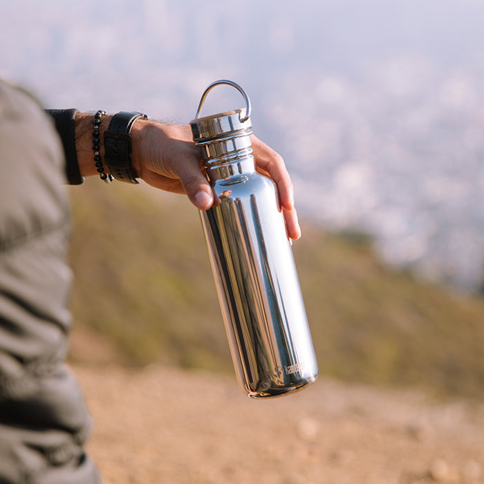 27oz-reflect-with-bamboo-cap-c4 K27SSLRF-MS-BAMBOO_reflect_bottle_hand_lifestyle.jpg