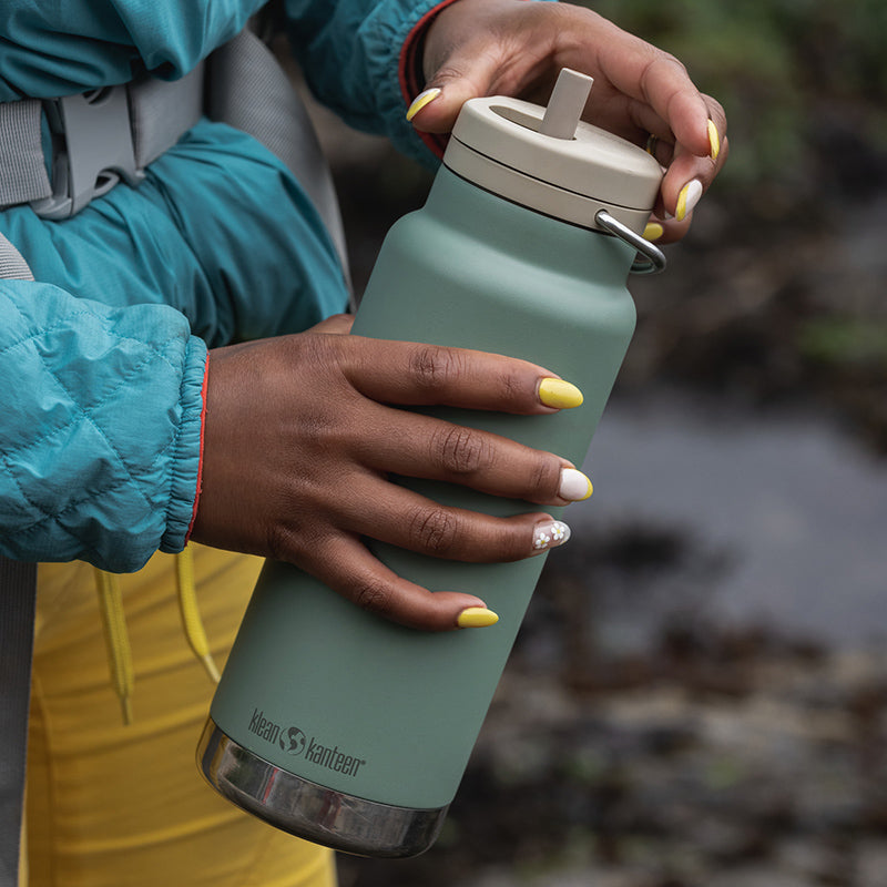 32oz-tkwide-made-to-do-more-bundle-o8 tkwide_32oz_insulated_bottle_twist_closeup_seapsray_hand_square.jpg